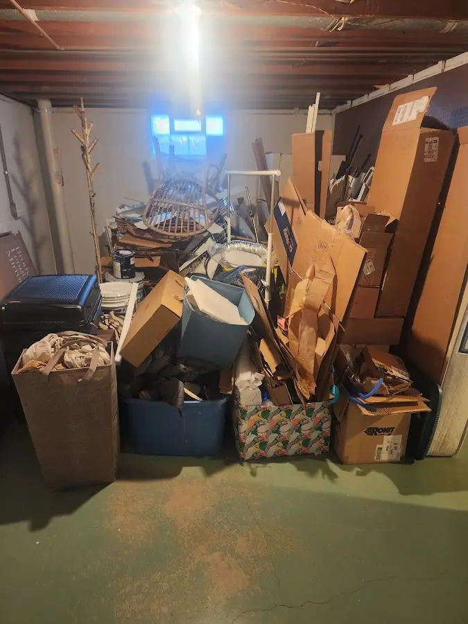 Roll-off dumpster container at job site for 2 Yard Dumpster Rental in Red Hill